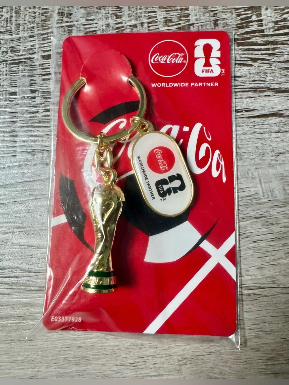 Coca-Cola FIFA World Cup Trophy Tour 2026. This Coca-Cola souvenir keychain,